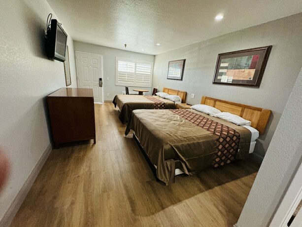 Imagen de la habitación del Hotel Morganhill Inn Motel. Foto 13