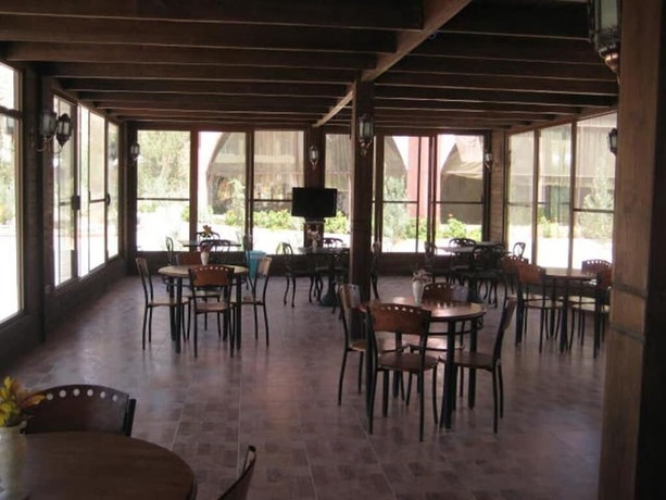 Imagen del bar/restaurante del Hotel Morgenland Holly Village. Foto 15