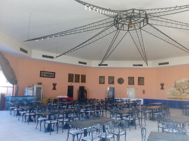 Imagen del bar/restaurante del Hotel Morgenland Holly Village. Foto 16