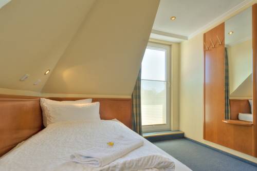 Imagen de la habitación del Hotel Morgensonne, B&uuml;sum. Foto 3