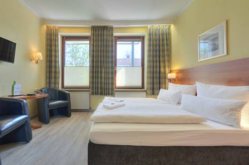 Imagen de la habitación del Hotel Morgensonne, B&uuml;sum. Foto 5