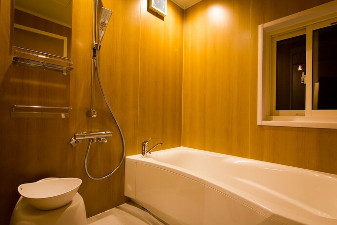 Imagen de la habitación del Hotel Morino Lodge Chalets. Foto 13