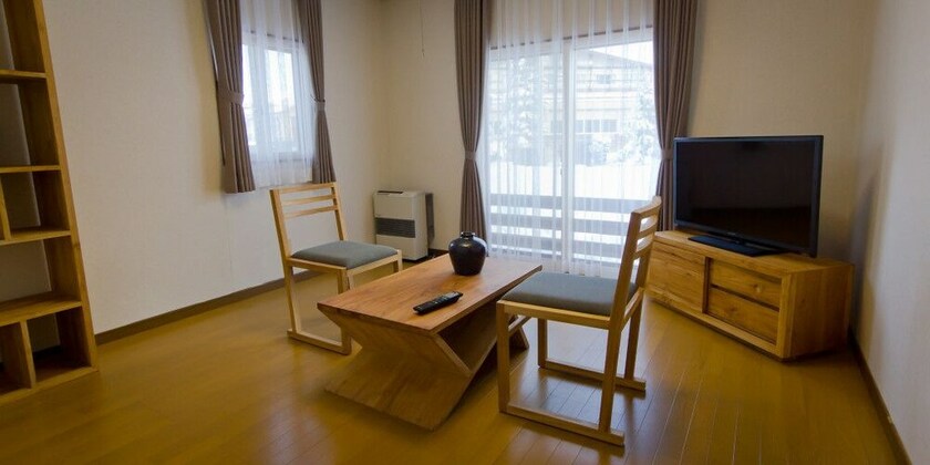Imagen de la habitación del Hotel Morino Lodge Chalets. Foto 27
