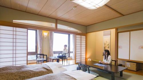 Imagen de la habitación del Hotel Morinokaze Oshuku. Foto 14