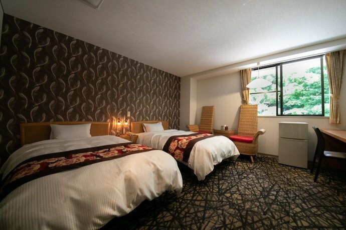 Imagen de la habitación del Hotel Morinoyu Yufuin Yasuha. Foto 16