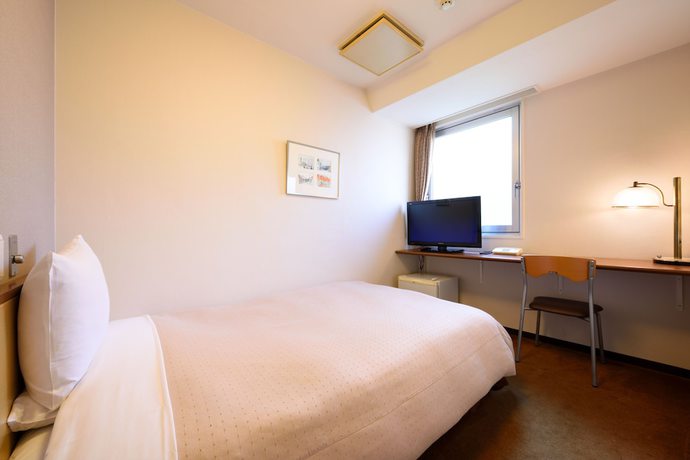 Imagen de la habitación del Hotel Morioka City. Foto 11
