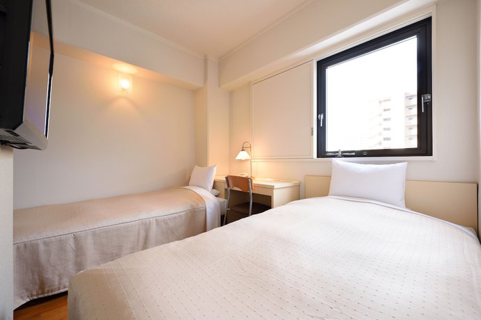 Imagen de la habitación del Hotel Morioka New City. Foto 14