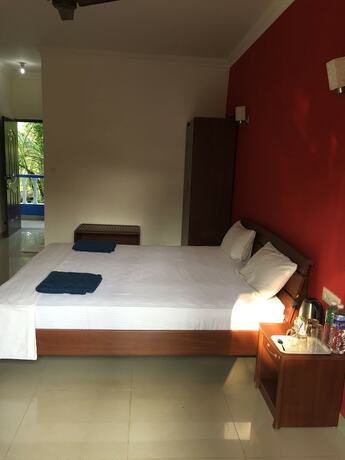 Imagen de la habitación del Hotel Morjim Coco Palms Resort. Foto 2