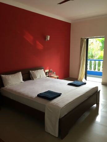 Imagen de la habitación del Hotel Morjim Coco Palms Resort. Foto 3