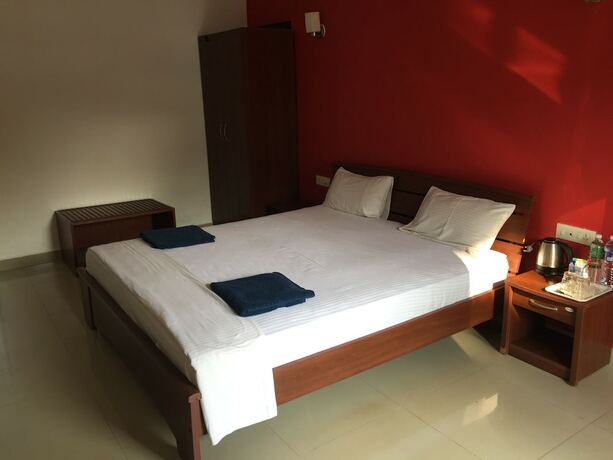 Imagen de la habitación del Hotel Morjim Coco Palms Resort. Foto 5