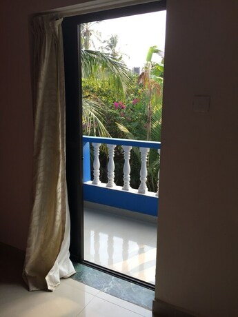 Imagen de la habitación del Hotel Morjim Coco Palms Resort. Foto 8