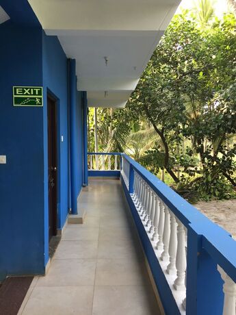 Imagen de la habitación del Hotel Morjim Coco Palms Resort. Foto 13