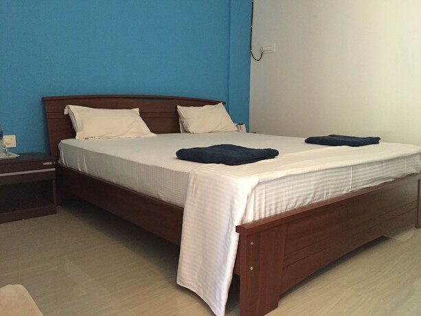 Imagen de la habitación del Hotel Morjim Coco Palms Resort. Foto 15
