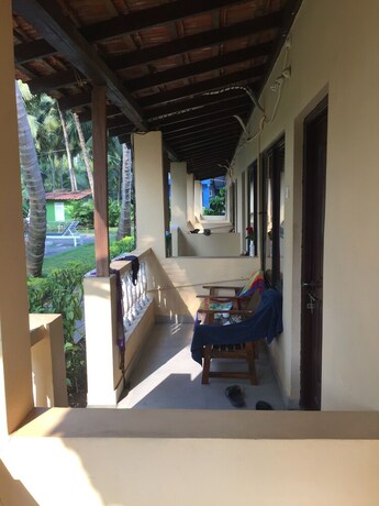 Imagen de la habitación del Hotel Morjim Coco Palms Resort. Foto 19