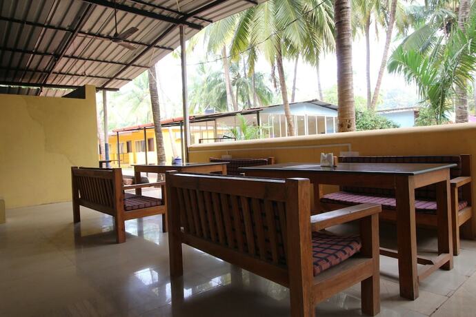 Imagen del bar/restaurante del Hotel Morjim Grand Inn. Foto 5