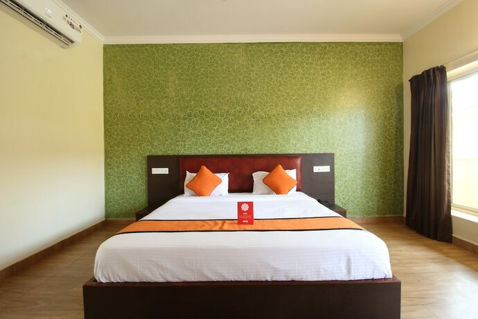 Imagen de la habitación del Hotel Morjim Grand Inn. Foto 10