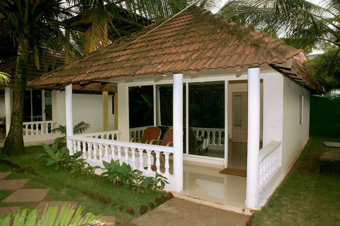 Imagen de la habitación del Hotel Morjim Holiday Beach Resort. Foto 9