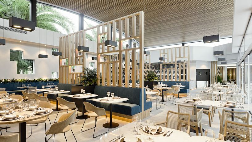 Imagen del bar/restaurante del Hotel Morlans Suites. Foto 3