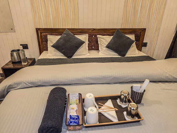 Imagen de la habitación del Hotel Morning Breeze Homestay Kanatal. Foto 7