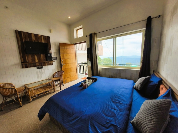 Imagen de la habitación del Hotel Morning Breeze Homestay Kanatal. Foto 14