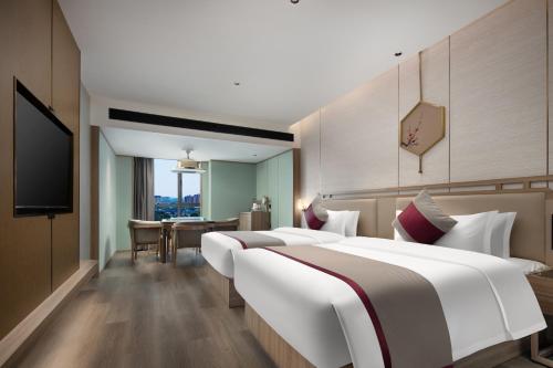Imagen de la habitación del Hotel Morning, Changsha Guihuaping Metro Station. Foto 16
