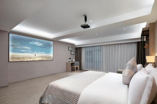Imagen de la habitación del Hotel Morning, Chenzhou Anren Xintiandi Plaza. Foto 15