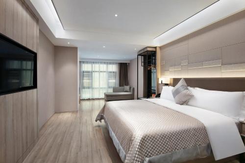 Imagen de la habitación del Hotel Morning, Chenzhou Anren Xintiandi Plaza. Foto 16