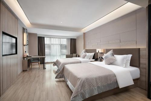 Imagen de la habitación del Hotel Morning, Chenzhou Anren Xintiandi Plaza. Foto 17