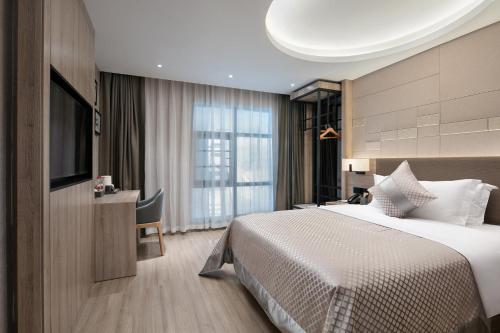 Imagen de la habitación del Hotel Morning, Chenzhou Anren Xintiandi Plaza. Foto 18