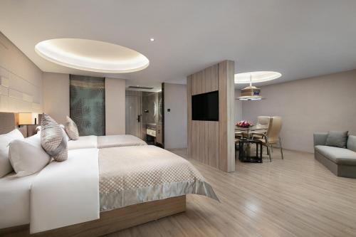 Imagen de la habitación del Hotel Morning, Chenzhou Anren Xintiandi Plaza. Foto 19