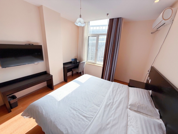 Imagen de la habitación del Hotel Morning Wind Urban （May Fourth Square Branch). Foto 7