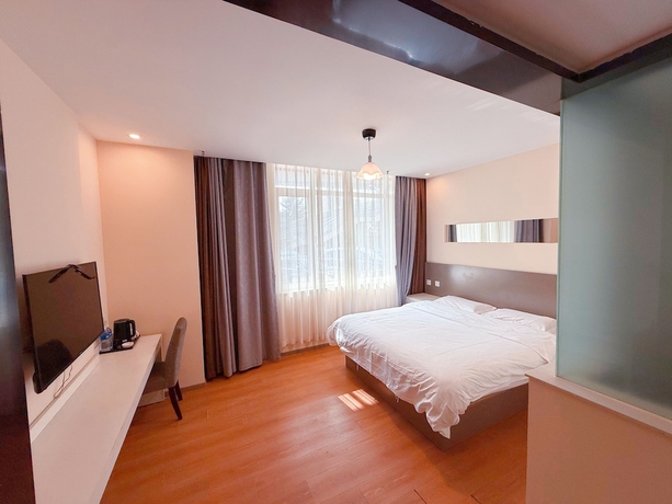 Imagen de la habitación del Hotel Morning Wind Urban （May Fourth Square Branch). Foto 8