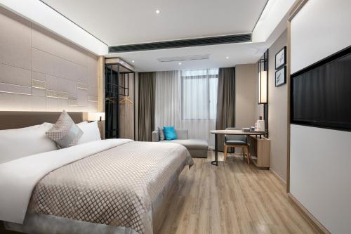 Imagen de la habitación del Hotel Morning, Xiangxiang. Foto 14