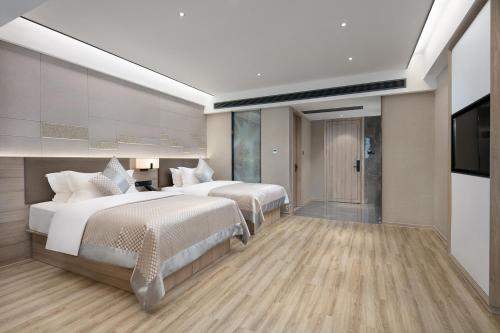 Imagen de la habitación del Hotel Morning, Xiangxiang. Foto 16