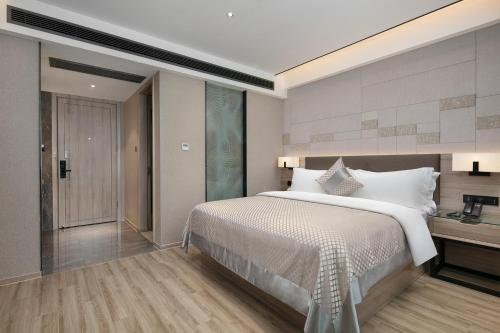 Imagen de la habitación del Hotel Morning, Xiangxiang. Foto 17