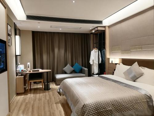 Imagen de la habitación del Hotel Morning, Xiangxiang. Foto 20