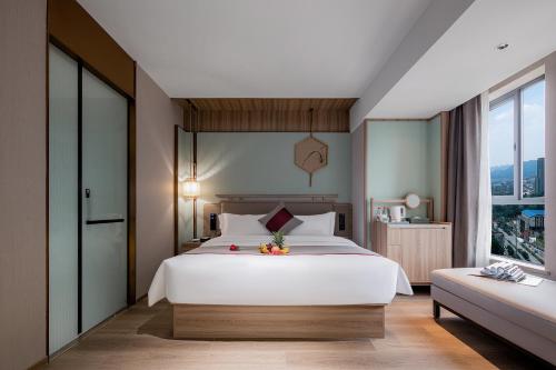 Imagen de la habitación del Hotel Morning, Zhuzhou Yunlong Vocational Education City. Foto 17