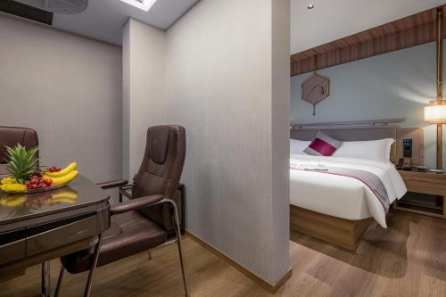 Imagen de la habitación del Hotel Morning, Zhuzhou Yunlong Vocational Education City. Foto 18