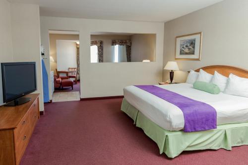 Imagen de la habitación del Hotel MorningGlory, Resort & Suites. Foto 6