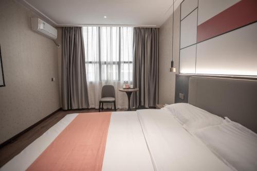 Imagen de la habitación del Hotel Morninginn, Chuanshan Square. Foto 14