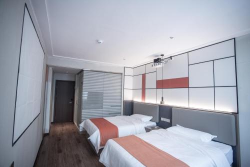 Imagen de la habitación del Hotel Morninginn, Chuanshan Square. Foto 16