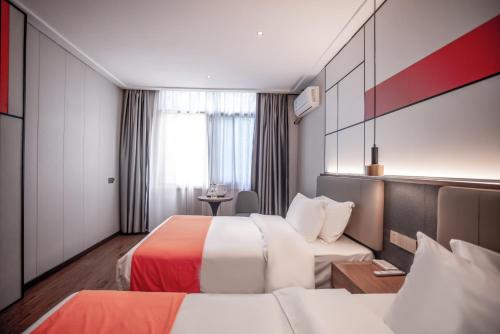 Imagen de la habitación del Hotel Morninginn, Chuanshan Square. Foto 19