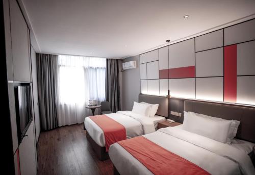 Imagen de la habitación del Hotel Morninginn, Chuanshan Square. Foto 20