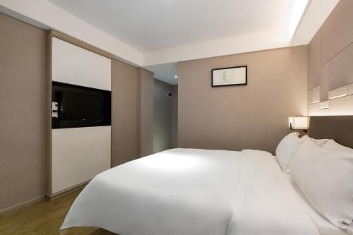 Imagen de la habitación del Hotel Morninginn, Jiefang Road. Foto 15