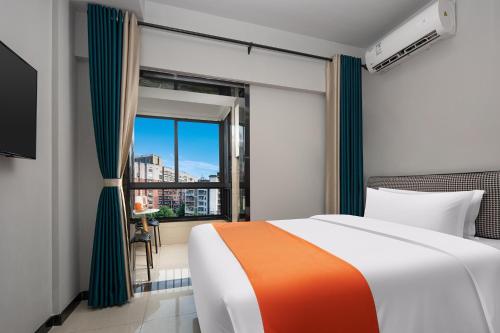 Imagen de la habitación del Hotel Morninginn, Jingzhu Square. Foto 18