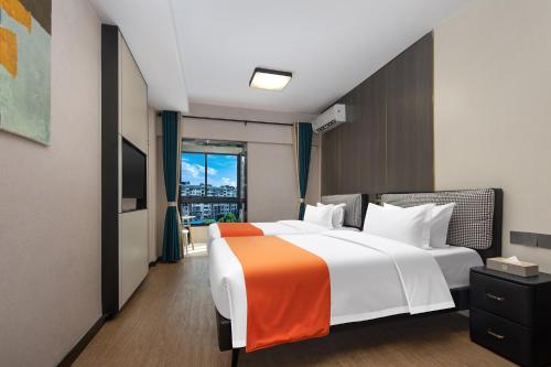 Imagen de la habitación del Hotel Morninginn, Jingzhu Square. Foto 19