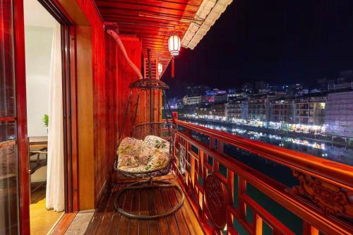 Imagen de la habitación del Hotel Morninginn, Phoenix Ancient City Tuojiang. Foto 13