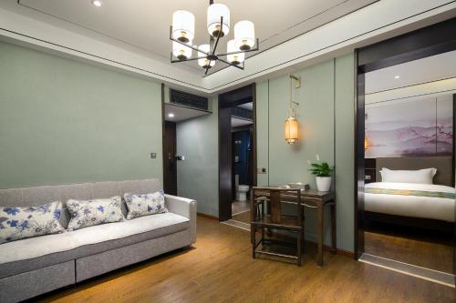 Imagen de la habitación del Hotel Morninginn, Phoenix Ancient City Tuojiang. Foto 18