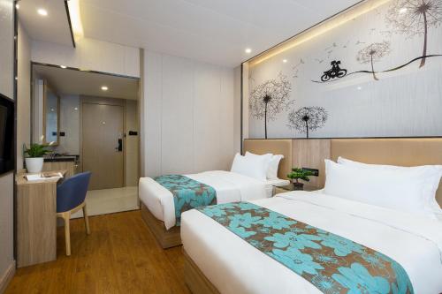 Imagen de la habitación del Hotel Morninginn, Phoenix Ancient City Tuojiang. Foto 19