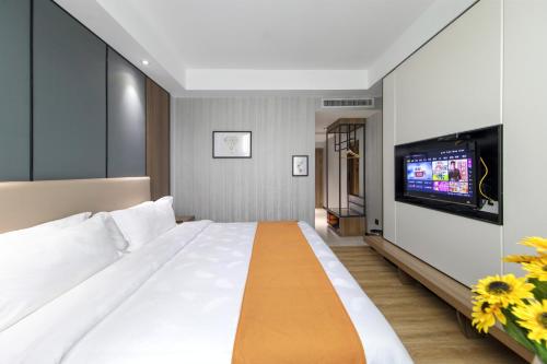 Imagen de la habitación del Hotel Morninginn, Qingyuan Gulong Gorge Wanda Plaza. Foto 6